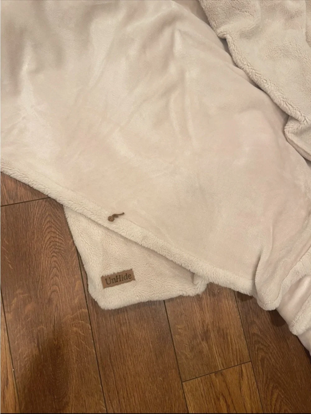 UnHide blanket in cream 60 by 80